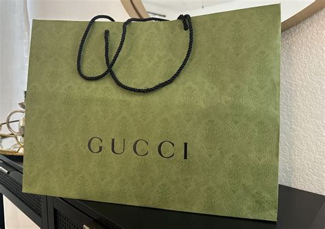 gucci cairns|gucci shopping bag.